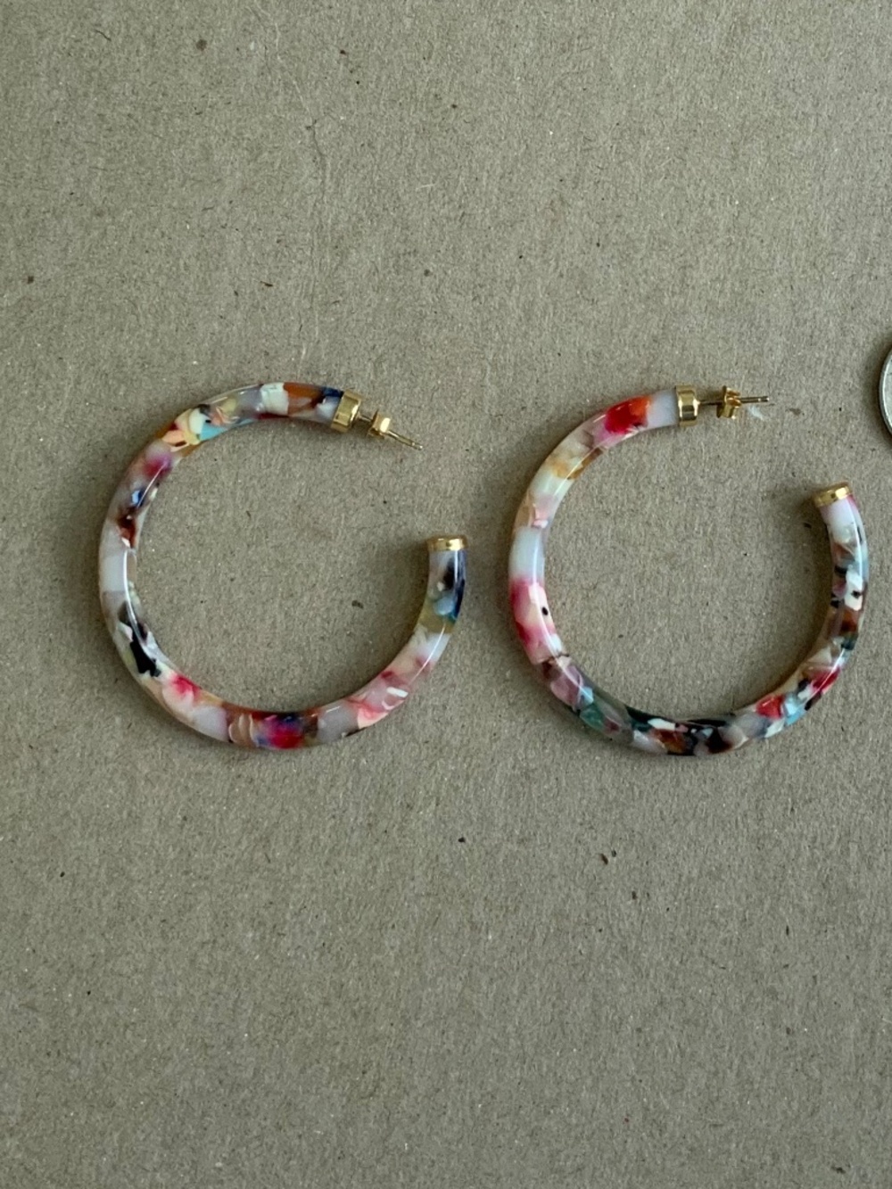 Multi-color hoops, pre-owned. Light weight.